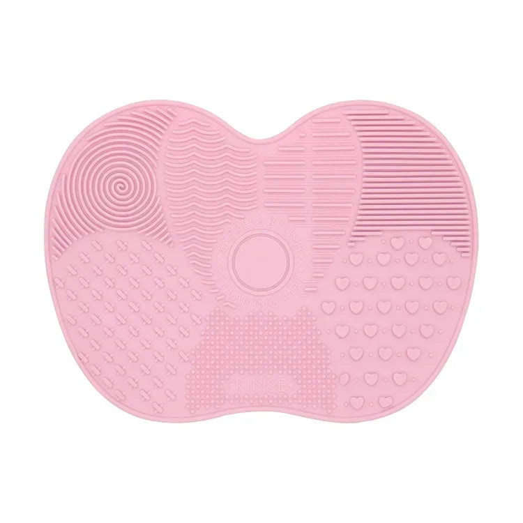 Nova Glam Essentials colorful silicone brush cleaner pad removing foundation from makeup brushes