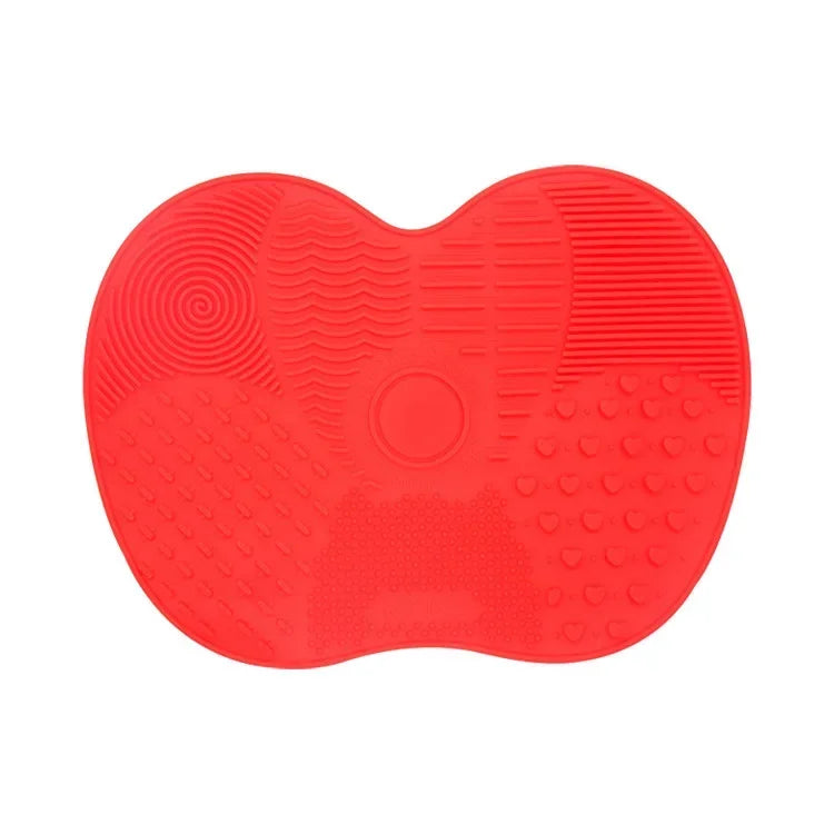 Nova Glam Essentials colorful silicone brush cleaner pad removing foundation from makeup brushes