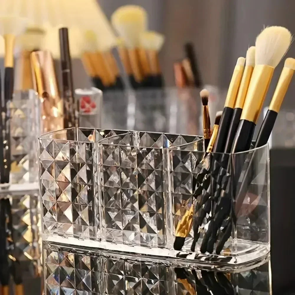 Nova Glam Essentials diamond-shaped acrylic makeup brush holder on a modern desk