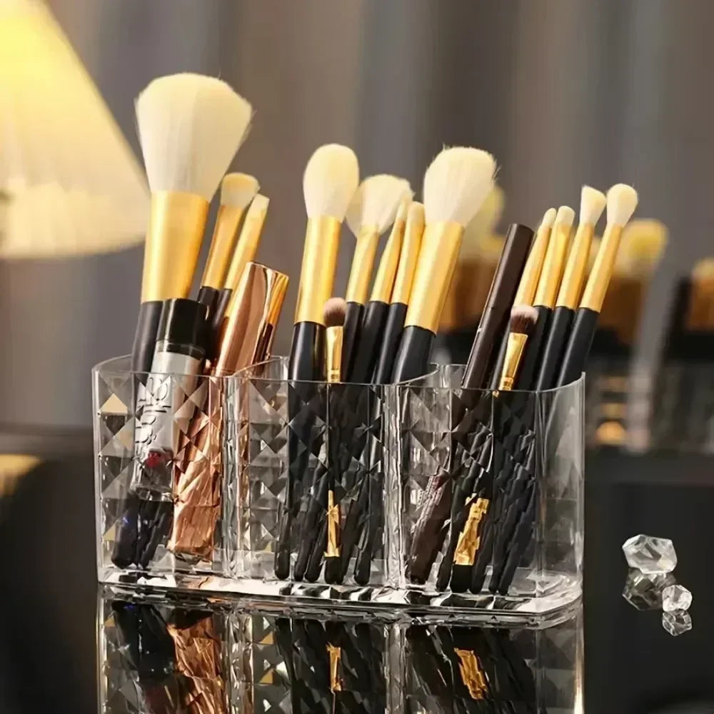 Nova Glam Essentials diamond-shaped acrylic makeup brush holder on a modern desk