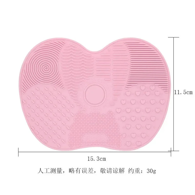 Nova Glam Essentials colorful silicone brush cleaner pad removing foundation from makeup brushes
