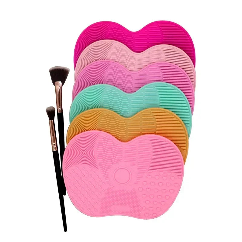 Nova Glam Essentials colorful silicone brush cleaner pad removing foundation from makeup brushes
