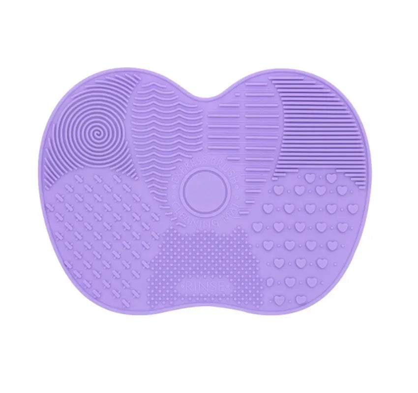 Nova Glam Essentials colorful silicone brush cleaner pad removing foundation from makeup brushes