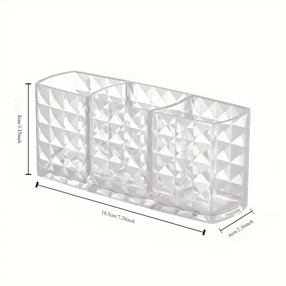 Nova Glam Essentials diamond-shaped acrylic makeup brush holder on a modern desk